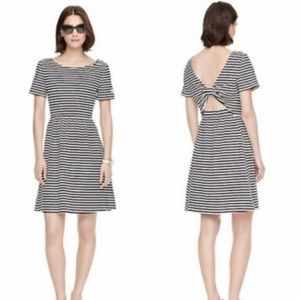 Kate Spade black and white stripe dress with bow back detail.